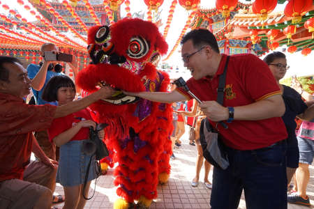 Kuala Lumpur, Malaysia - February 5, 2019: Beautiful Lion Dance during Chinese New Year celebration in Thean Hou Temple.のeditorial素材