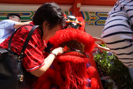 Kuala Lumpur, Malaysia - February 5, 2019: Beautiful Lion Dance during Chinese New Year celebration in Thean Hou Temple.のeditorial素材