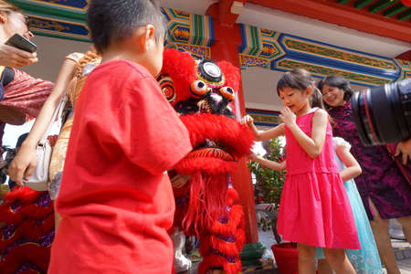 Kuala Lumpur, Malaysia - February 5, 2019: Beautiful Lion Dance during Chinese New Year celebration in Thean Hou Temple.のeditorial素材