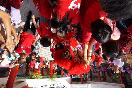 Kuala Lumpur, Malaysia - February 5, 2019: Beautiful Lion Dance during Chinese New Year celebration in Thean Hou Temple.のeditorial素材