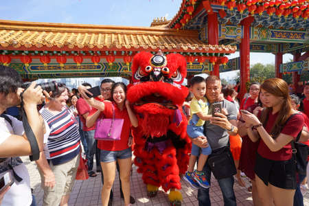 Kuala Lumpur, Malaysia - February 5, 2019: Beautiful Lion Dance during Chinese New Year celebration in Thean Hou Temple.のeditorial素材