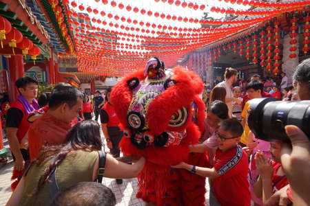 Kuala Lumpur, Malaysia - February 5, 2019: Beautiful Lion Dance during Chinese New Year celebration in Thean Hou Temple.のeditorial素材