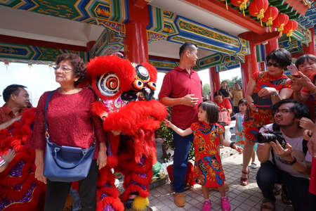 Kuala Lumpur, Malaysia - February 5, 2019: Beautiful Lion Dance during Chinese New Year celebration in Thean Hou Temple.のeditorial素材