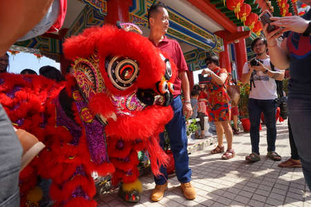 Kuala Lumpur, Malaysia - February 5, 2019: Beautiful Lion Dance during Chinese New Year celebration in Thean Hou Temple.のeditorial素材