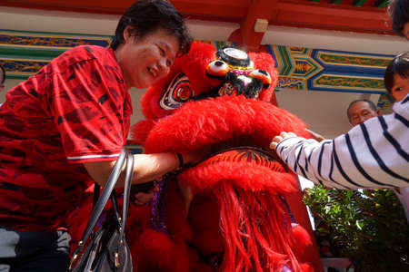 Kuala Lumpur, Malaysia - February 5, 2019: Beautiful Lion Dance during Chinese New Year celebration in Thean Hou Temple.のeditorial素材