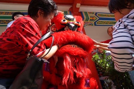 Kuala Lumpur, Malaysia - February 5, 2019: Beautiful Lion Dance during Chinese New Year celebration in Thean Hou Temple.のeditorial素材