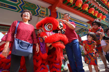 Kuala Lumpur, Malaysia - February 5, 2019: Beautiful Lion Dance during Chinese New Year celebration in Thean Hou Temple.のeditorial素材