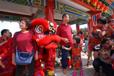 Kuala Lumpur, Malaysia - February 5, 2019: Beautiful Lion Dance during Chinese New Year celebration in Thean Hou Temple.のeditorial素材