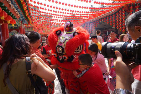 Kuala Lumpur, Malaysia - February 5, 2019: Beautiful Lion Dance during Chinese New Year celebration in Thean Hou Temple.のeditorial素材