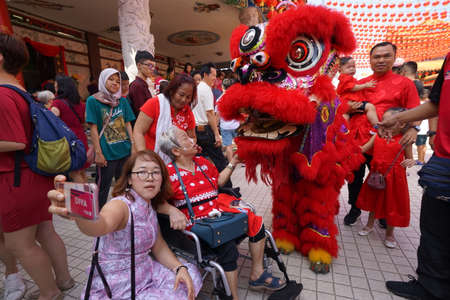Kuala Lumpur, Malaysia - February 5, 2019: Beautiful Lion Dance during Chinese New Year celebration in Thean Hou Temple.のeditorial素材