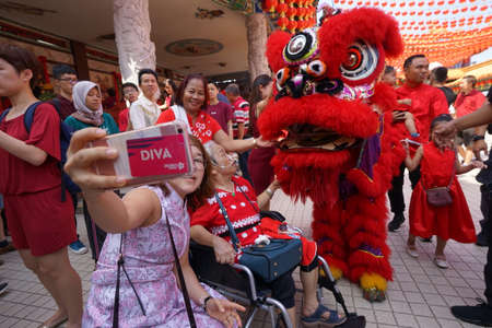 Kuala Lumpur, Malaysia - February 5, 2019: Beautiful Lion Dance during Chinese New Year celebration in Thean Hou Temple.のeditorial素材