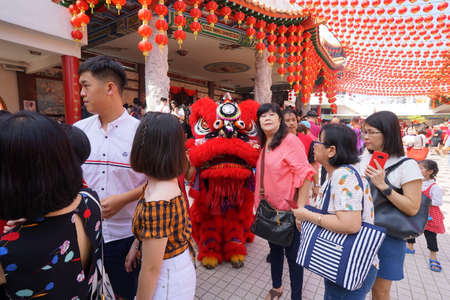 Kuala Lumpur, Malaysia - February 5, 2019: Beautiful Lion Dance during Chinese New Year celebration in Thean Hou Temple.のeditorial素材