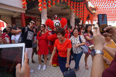 Kuala Lumpur, Malaysia - February 5, 2019: Beautiful Lion Dance during Chinese New Year celebration in Thean Hou Temple.のeditorial素材