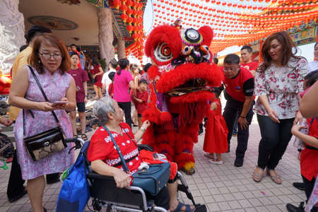 Kuala Lumpur, Malaysia - February 5, 2019: Beautiful Lion Dance during Chinese New Year celebration in Thean Hou Temple.のeditorial素材
