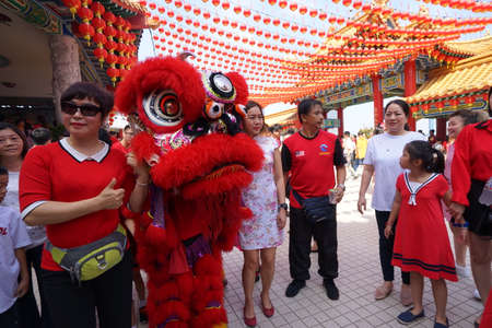 Kuala Lumpur, Malaysia - February 5, 2019: Beautiful Lion Dance during Chinese New Year celebration in Thean Hou Temple.のeditorial素材