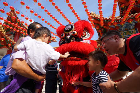 Kuala Lumpur, Malaysia - February 5, 2019: Beautiful Lion Dance during Chinese New Year celebration in Thean Hou Temple.のeditorial素材