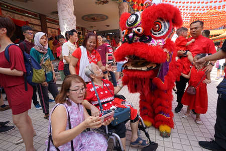 Kuala Lumpur, Malaysia - February 5, 2019: Beautiful Lion Dance during Chinese New Year celebration in Thean Hou Temple.のeditorial素材