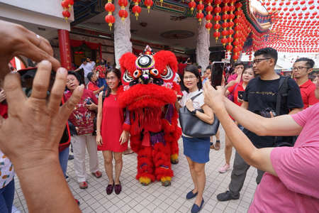 Kuala Lumpur, Malaysia - February 5, 2019: Beautiful Lion Dance during Chinese New Year celebration in Thean Hou Temple.のeditorial素材