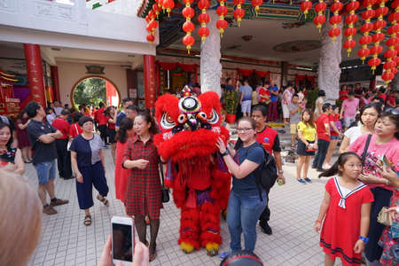Kuala Lumpur, Malaysia - February 5, 2019: Beautiful Lion Dance during Chinese New Year celebration in Thean Hou Temple.のeditorial素材