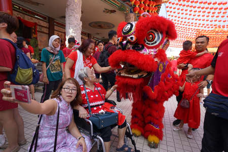 Kuala Lumpur, Malaysia - February 5, 2019: Beautiful Lion Dance during Chinese New Year celebration in Thean Hou Temple.のeditorial素材