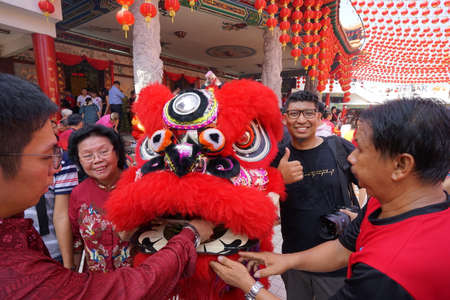 Kuala Lumpur, Malaysia - February 5, 2019: Beautiful Lion Dance during Chinese New Year celebration in Thean Hou Temple.のeditorial素材