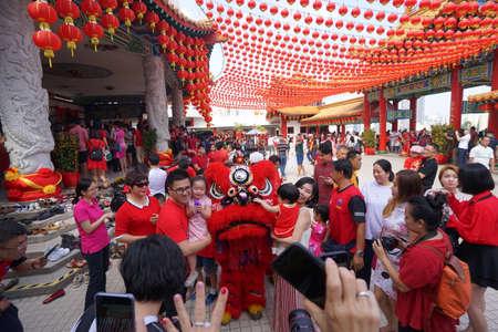 Kuala Lumpur, Malaysia - February 5, 2019: Beautiful Lion Dance during Chinese New Year celebration in Thean Hou Temple.のeditorial素材