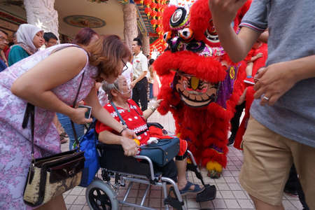 Kuala Lumpur, Malaysia - February 5, 2019: Beautiful Lion Dance during Chinese New Year celebration in Thean Hou Temple.のeditorial素材