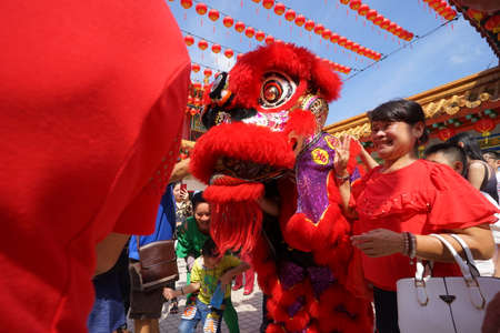 Kuala Lumpur, Malaysia - February 5, 2019: Beautiful Lion Dance during Chinese New Year celebration in Thean Hou Temple.のeditorial素材