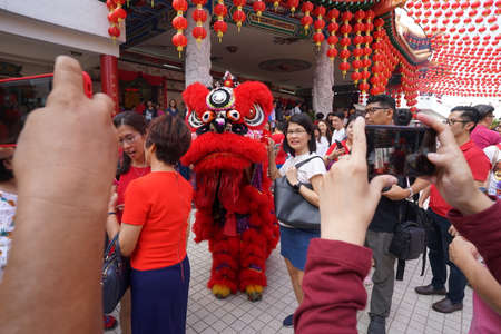 Kuala Lumpur, Malaysia - February 5, 2019: Beautiful Lion Dance during Chinese New Year celebration in Thean Hou Temple.のeditorial素材