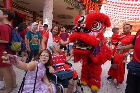Kuala Lumpur, Malaysia - February 5, 2019: Beautiful Lion Dance during Chinese New Year celebration in Thean Hou Temple.のeditorial素材