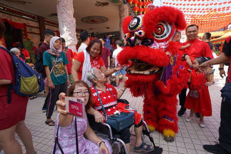 Kuala Lumpur, Malaysia - February 5, 2019: Beautiful Lion Dance during Chinese New Year celebration in Thean Hou Temple.のeditorial素材
