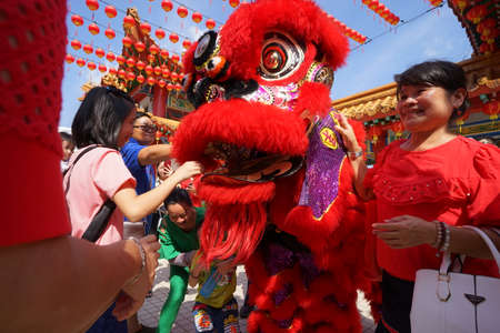 Kuala Lumpur, Malaysia - February 5, 2019: Beautiful Lion Dance during Chinese New Year celebration in Thean Hou Temple.のeditorial素材