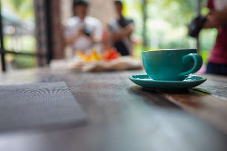 A cup of Coffee Latte on the table.の写真素材