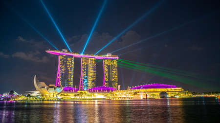 Singapore - February, 2020: Beautiful laser show at Marina Bay waterfront in Singapore at night. Wonderful laser show and water in Southeast Asia.のeditorial素材