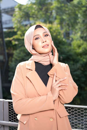 Cyberjaya, Malaysia â 25 December 2019: Fashion portraiture of young beautiful muslim woman wearing hijab.のeditorial素材