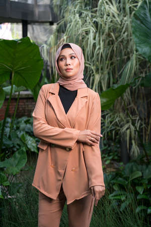 Cyberjaya, Malaysia â 25 December 2019: Fashion portraiture of young beautiful muslim woman wearing hijab.のeditorial素材