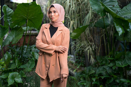 Cyberjaya, Malaysia â€“ 25 December 2019: Fashion portraiture of young beautiful muslim woman...