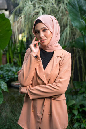 Cyberjaya, Malaysia â 25 December 2019: Fashion portraiture of young beautiful muslim woman wearing hijab.のeditorial素材