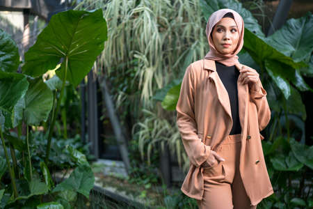 Cyberjaya, Malaysia â 25 December 2019: Fashion portraiture of young beautiful muslim woman wearing hijab.のeditorial素材