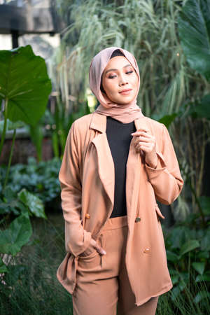 Cyberjaya, Malaysia â 25 December 2019: Fashion portraiture of young beautiful muslim woman wearing hijab.のeditorial素材