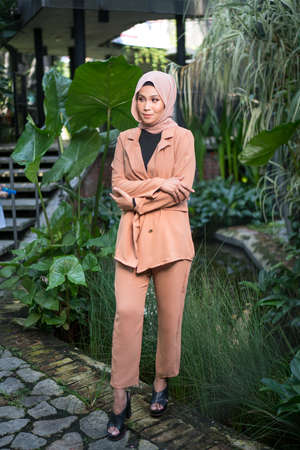 Cyberjaya, Malaysia â 25 December 2019: Fashion portraiture of young beautiful muslim woman wearing hijab.のeditorial素材