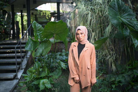 Cyberjaya, Malaysia â 25 December 2019: Fashion portraiture of young beautiful muslim woman wearing hijab.のeditorial素材
