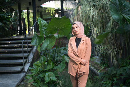Cyberjaya, Malaysia â 25 December 2019: Fashion portraiture of young beautiful muslim woman wearing hijab.のeditorial素材
