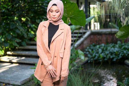 Cyberjaya, Malaysia â 25 December 2019: Fashion portraiture of young beautiful muslim woman wearing hijab.のeditorial素材