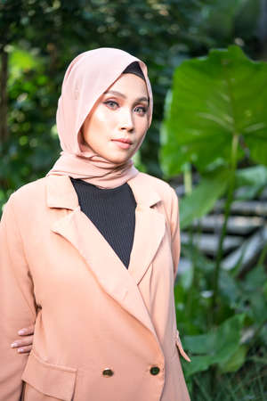 Cyberjaya, Malaysia â 25 December 2019: Fashion portraiture of young beautiful muslim woman wearing hijab.のeditorial素材
