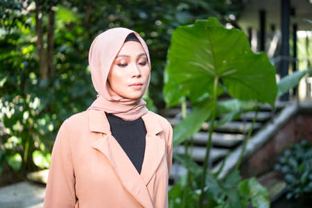 Cyberjaya, Malaysia â 25 December 2019: Fashion portraiture of young beautiful muslim woman wearing hijab.のeditorial素材