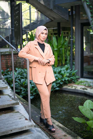Cyberjaya, Malaysia â 25 December 2019: Fashion portraiture of young beautiful muslim woman wearing hijab.のeditorial素材