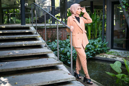 Cyberjaya, Malaysia â 25 December 2019: Fashion portraiture of young beautiful muslim woman wearing hijab.のeditorial素材