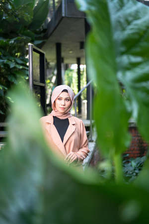 Cyberjaya, Malaysia â 25 December 2019: Fashion portraiture of young beautiful muslim woman wearing hijab.のeditorial素材