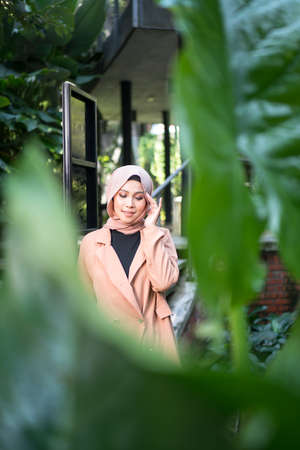 Cyberjaya, Malaysia â 25 December 2019: Fashion portraiture of young beautiful muslim woman wearing hijab.のeditorial素材